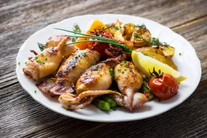 grilled squids with asparagus and potato stockpack adobe stock scaled